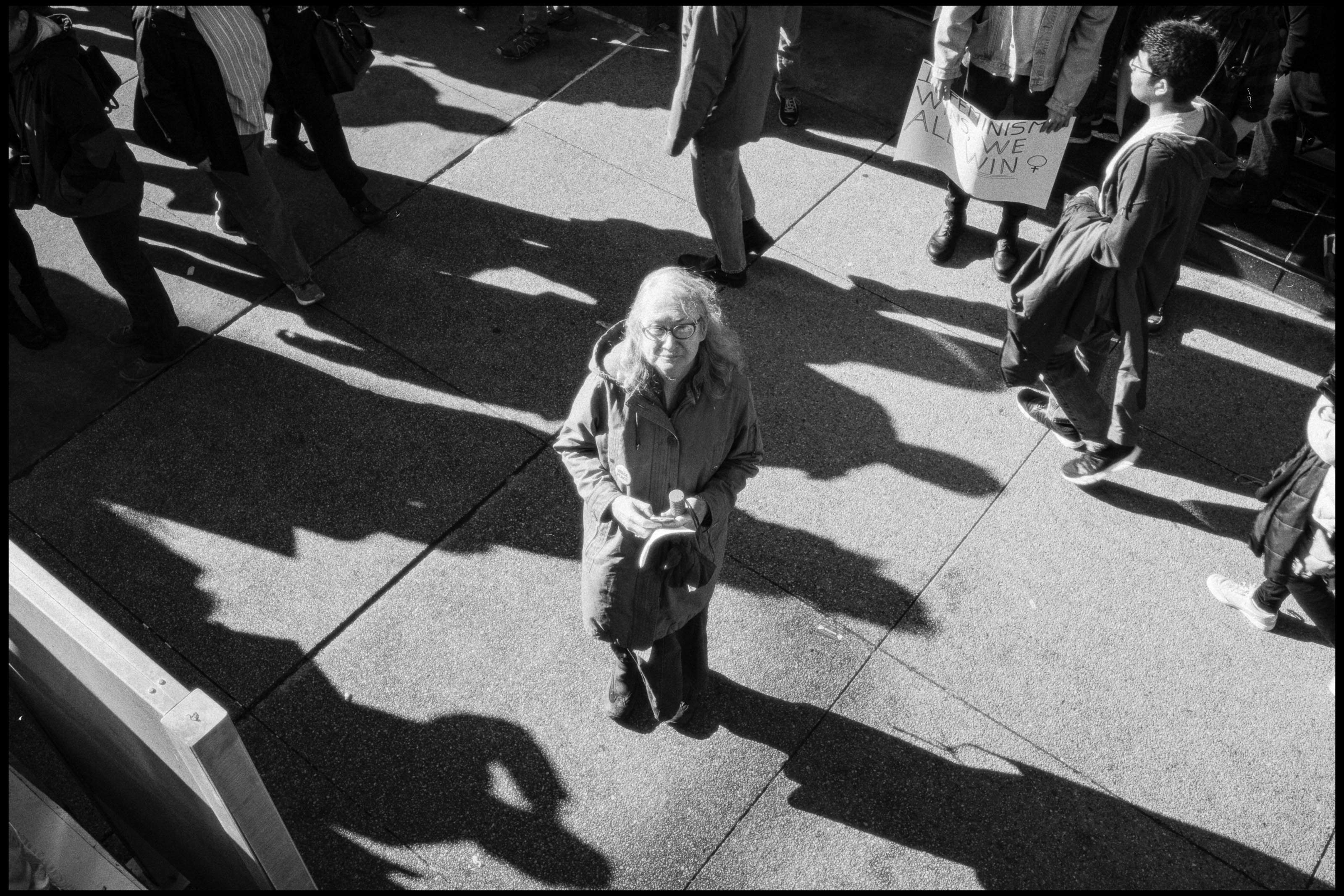 Elder woman looking up during the march, Chicago 2017