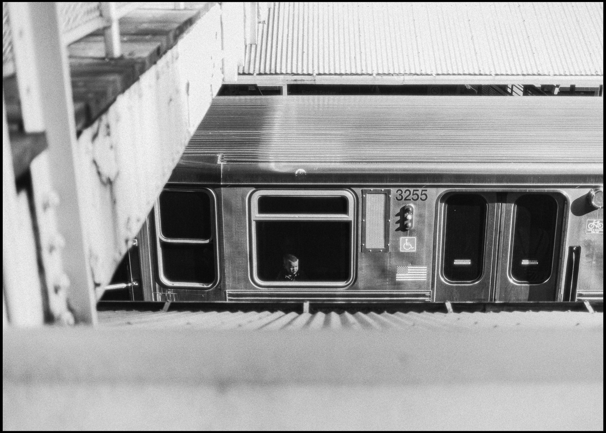 Kid on the CTA train, Women's March day, Chicago 2017