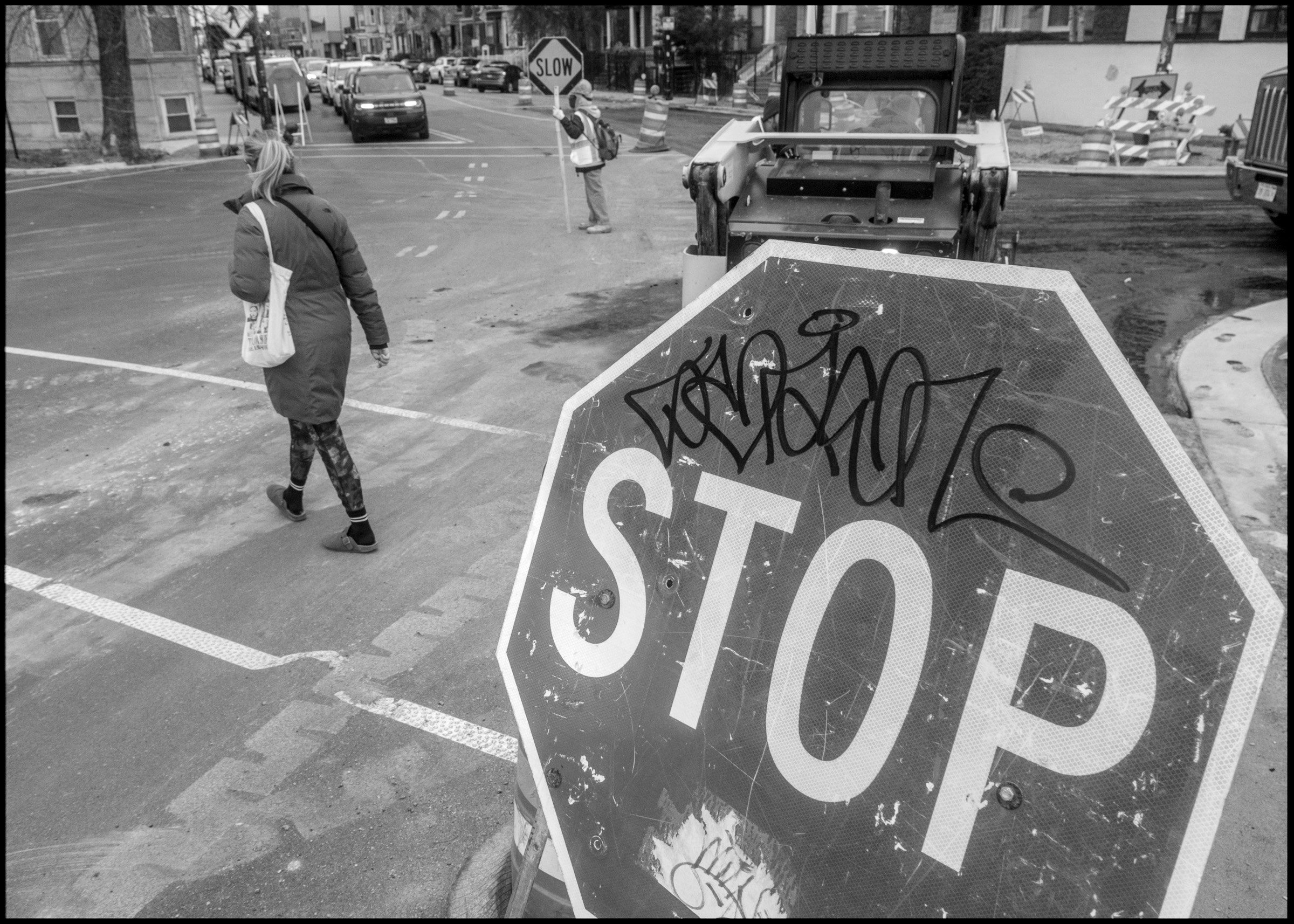 Stop sign with graffiti, Logan Square Chicago 2024