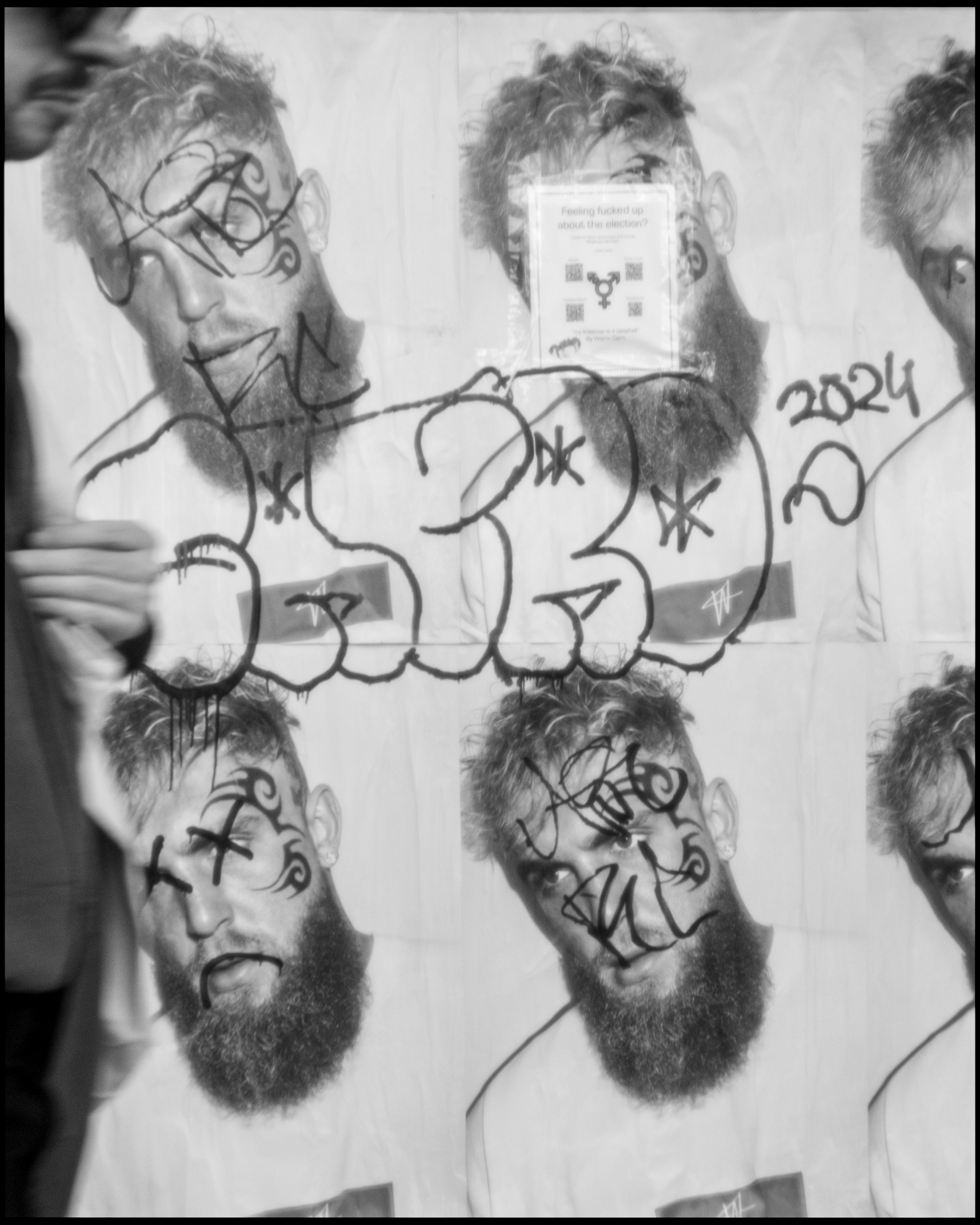 Logan Square wall writing with person nearby, Chicago 2024