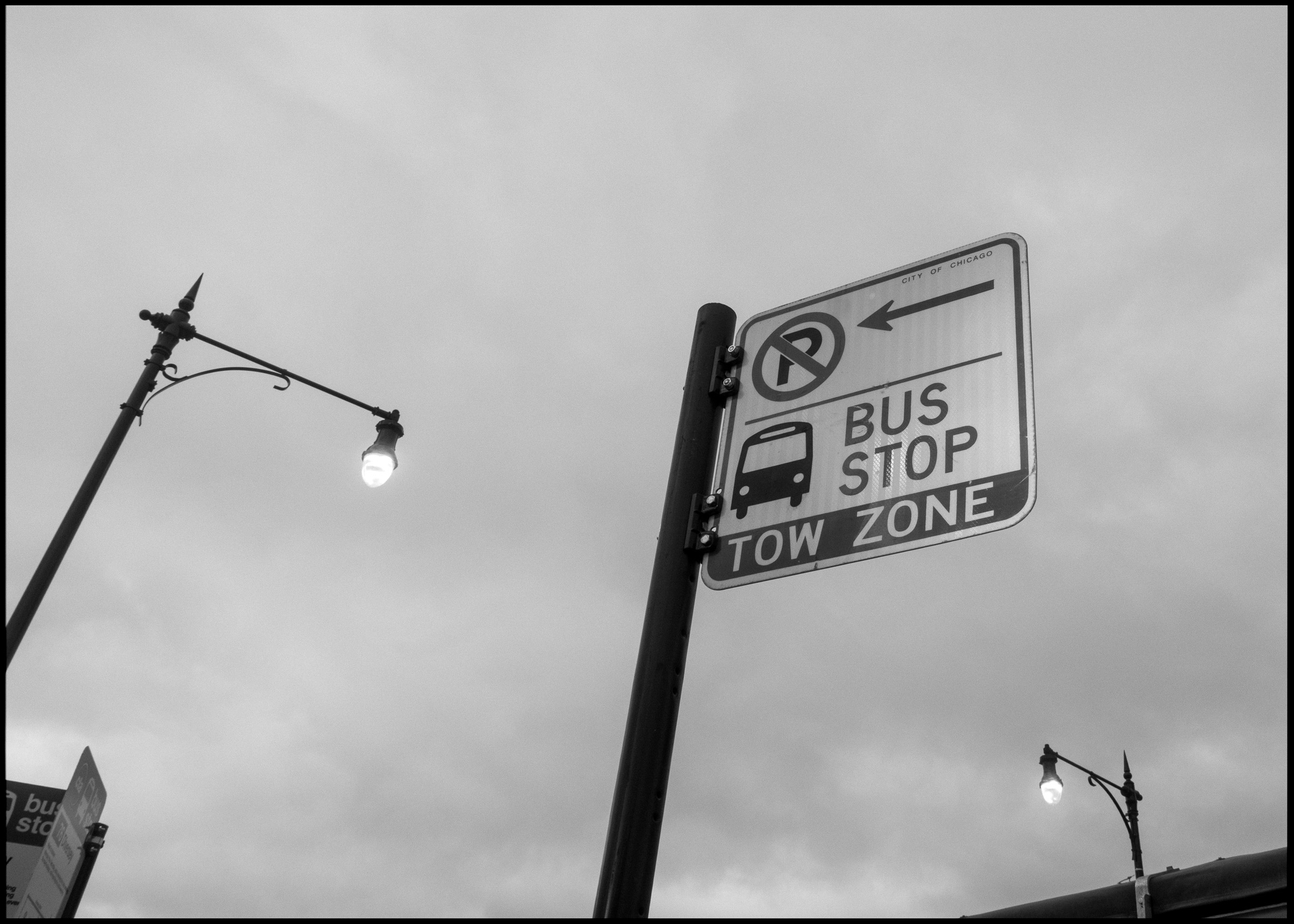 Bus stop sign in Logan Square Chicago 2024